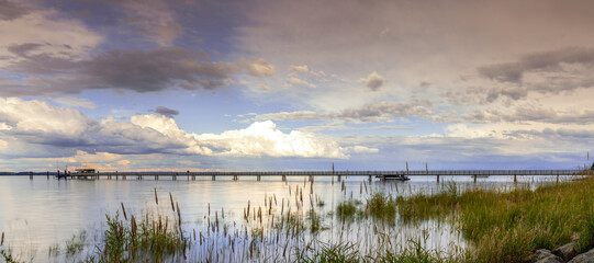 view of Lake Constance with the pier at Altnau in evening light