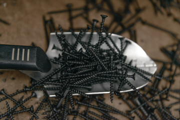 Nails close up. Metal nails background. Screws.