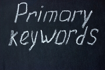 
The phrase on the dark board "primary keywords"