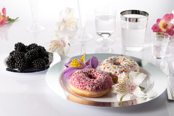donuts in a plate on the table