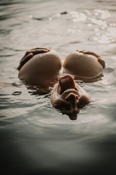 Woman swimming in lake