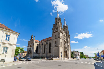 Naklejka na ściany i meble Vrsac, Serbia - June 04, 2020: A magnificent Roman – catholic cathedral dedicated to St Gerhard (serbian: Crkva Svetog Gerharda) was built in 1863. 