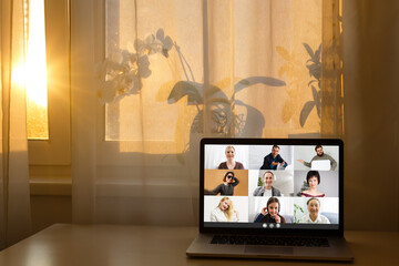 Fototapeta na wymiar Global communication concept using video conferencing on a laptop