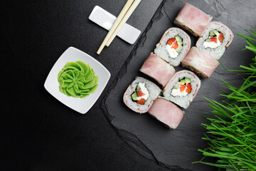 Sushi.  Texas Sushi rolls  on the dark background. Sushi food photo for menu.
