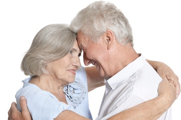 Portrait of cheerful senior couple at home