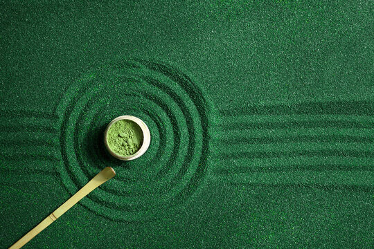 Green matcha powder background. Zen background. Top view.