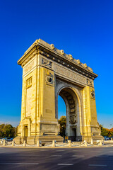 Fototapeta na wymiar It's Arcul de Triumf, a triumphal arch, the northern part of Bucharest, on the Kiseleff Road