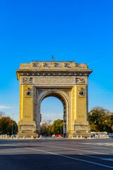 Fototapeta na wymiar It's Arcul de Triumf, a triumphal arch, the northern part of Bucharest, on the Kiseleff Road