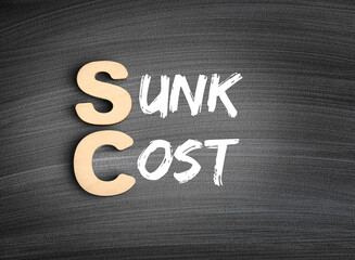 SC - Sunk Cost acronym, business concept on blackboard