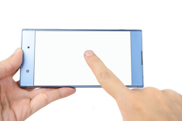 Person holding smartphone in a hand, phone in a woman's hand