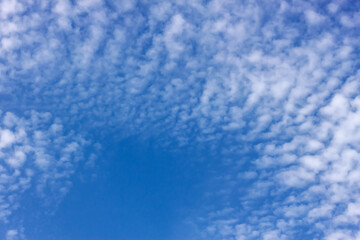 Sky with cloudscumulus clouds on clear blue sky before rain