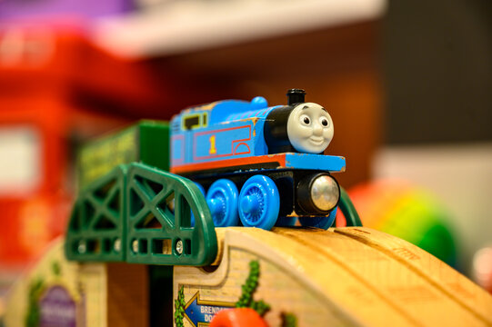 Tiffin, Iowa, USA - 11/2019:  Toy train crossing a bridge.  Thomas  is a popular railroad themed children's' toy.  