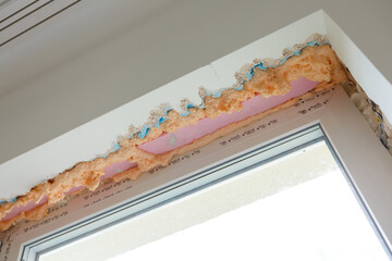 Process installation slopes of window. Using a moanting foam.
