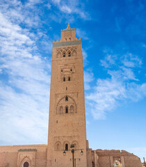 Fototapeta premium Kutubiyya Mosque or Koutoubia Mosque built in 1147 is the largest mosque with the tallest minaret at 77 m high in Marrakesh, Morocco.