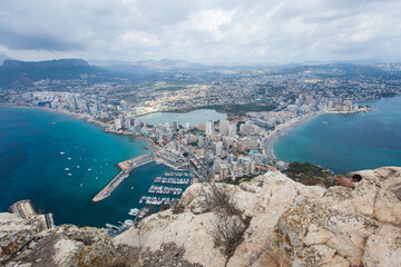 View of Calpe Calp town with Penon de Ifach mountain during the hiking to Penyal d'Ifac Natural...