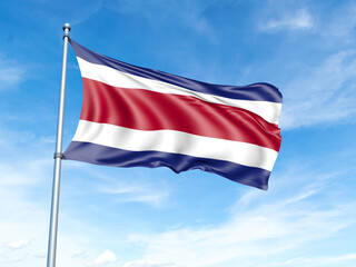Costa Rica flag on a pole against a blue sky background.