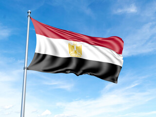 Egypt flag on a pole against a blue sky background.