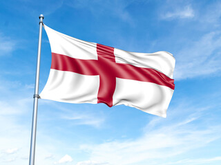 England flag on a pole against a blue sky background.