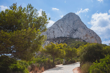 View of Calpe Calp town with Penon de Ifach mountain during the hiking to Penyal d'Ifac Natural...
