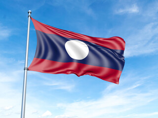 Laos flag on a pole against a blue sky background.