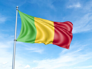 Naklejka na ściany i meble Mali flag on a pole against a blue sky background.
