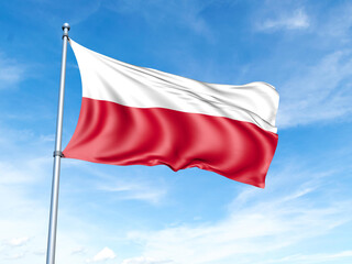 Poland flag on a pole against a blue sky background.