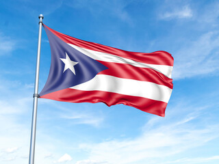 Puerto Rico flag on a pole against a blue sky background.