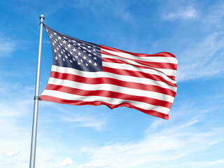 American flag on a pole against a blue sky background.
