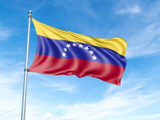 Venezuela flag on a pole against a blue sky background.