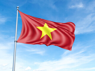 Vietnam flag on a pole against a blue sky background.