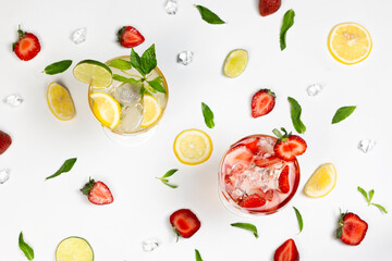 Strawberry cocktail and mojito with ice cube on summer freshness pattern background.