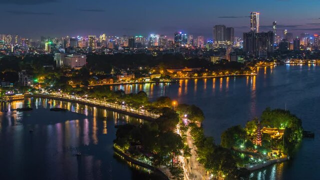 Hanoi, Vietnam, timelapse view of Hanoi skyline at dusk showing West Lake and Tay Ho District.