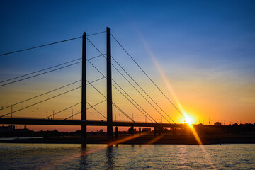 Stock Photo - View of Oberkassel bridge at sunset in Dusseldorf, Germany