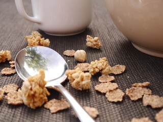 Cereals and spoon close up on the table