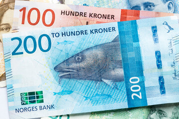 Obverse side of new Norwegian banknote series NOK 200 and 100 Kroner notes. Underneath, partial...