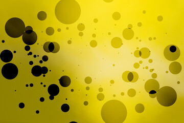 Concept background of round particles flowing against a yellow backdrop. Small and large, overlap and light transparent circles floating from bright middle.