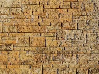 Yellow British stone wall
