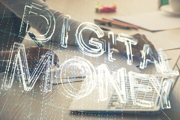 Double exposure of woman hands typing on computer and crypto market theme hologram drawing....