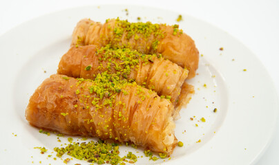 Turkish burma baklava, on a white background
