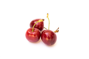 red cherries with a white background