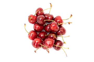 Obraz na płótnie Canvas red cherries with a white background
