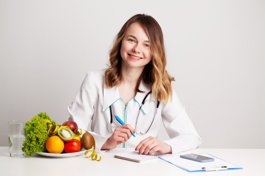 Nutritionist Makes A Diet Plan For Proper Nutrition For The Patient In His Office