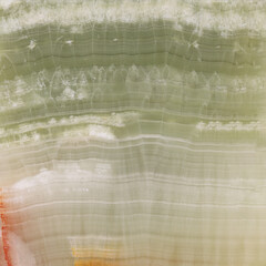 Texture of the polished surface of natural stone marble onyx greenish tint