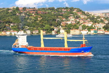 Cargo ship sailing into the open sea