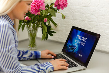 Cropped Image Of Businesswoman Using Laptop At Desk
