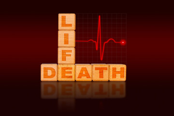 Life and Dealth Concept on Building Blocks and Heart Rate Stopped