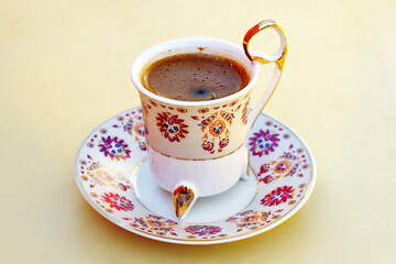 Cup of coffee in a decorative cup