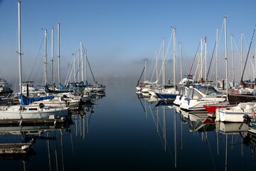 Docks on Puget Sound on a calm, foggy day