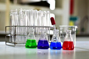 Closeup of Chemical tube for research, scientific experiments for the future at lab background, selective focus.