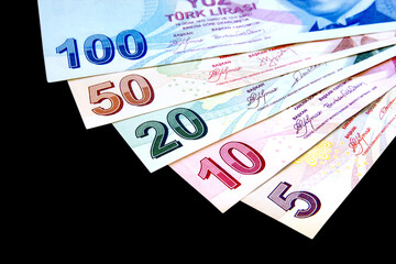 Bunch of money, isolated on black